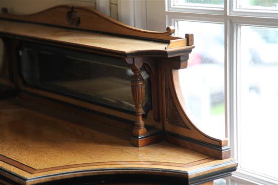 Lamb of Manchester. A Victorian Aesthetic movement ebony strung golden oak bookcase, W.3ft 11in. D.1ft 4in. H.4ft 6in.